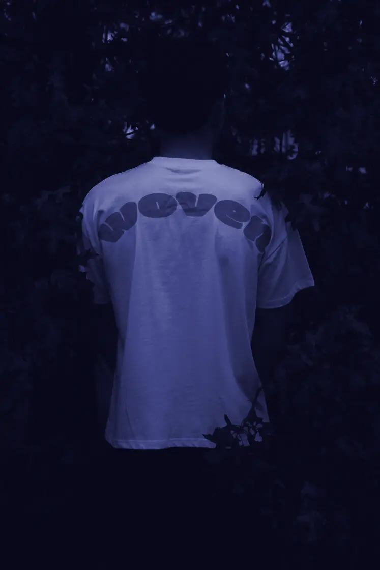 White Woven tee with pink logo, autumn leaves